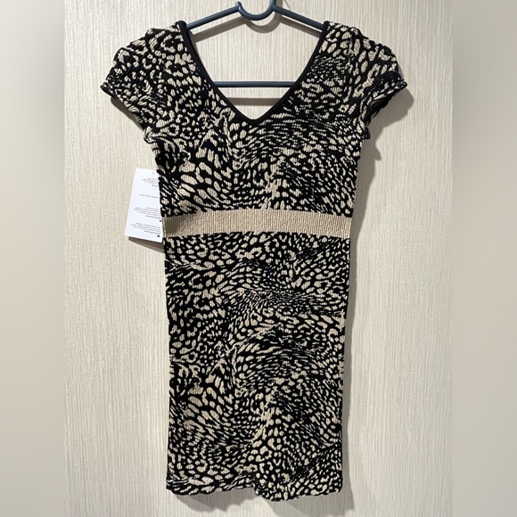 BEBE Stretch Nylon/Spandex w/Gold Metallic Accents Cap Sleeve “V”Neck Mini Dress - Picture 2 of 10